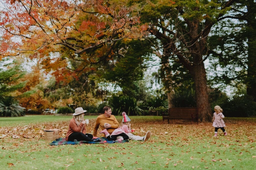A family picnic in the Albury Botanic Gardens.